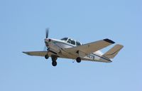 N627B @ KOSH - Beech N35