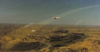 N3368E - 68E seen flying over some interesting looking terrain in North Dakota. - by S B J