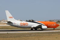 OE-IBW @ LMML - 737-400 OE-IBW TNT - by Raymond Zammit