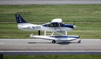 HL1217 @ RKSS - HL1217 Cessna 206 floatplane departing Seoul  Gimpo airport on 3rd June 2016 - by N Warner