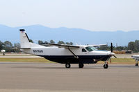 N9766B @ KRDD - Redding package express ramp - by Tom Vance