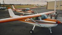 N9038H @ O88 - Cessna 9038H, background, parked on the ramp at the old Rio Vista Airport in California. - by Clayton Eddy