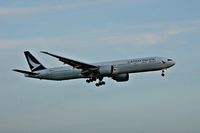 B-KPM @ YVR - In new livery,arriving as CX888 from Hong Kong.