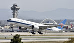 B-2073 @ KLAX - Departing LAX on 25L - by Todd Royer