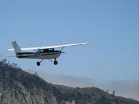 N704UT @ SZP - 1976 Cessna 150M, Continental O-200 100 Hp, takeoff climb Rwy 22 - by Doug Robertson