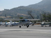 N704UT @ SZP - 1976 Cessna 150M, Continental O-200 100 Hp, takeoff climb Rwy 22 - by Doug Robertson