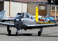 N144PM @ KRHV - Livermore-based 1957 Beechcraft T34B Mentor taxing out for departure at Reid Hillview Airport, San Jose, CA. - by Chris Leipelt