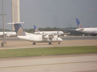 N362PH @ IAD - DASH 8 - by Christian Maurer