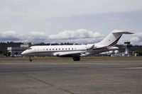 N113QS @ KBFI - Bombardier taxing out for takeoff. - by Eric Olsen