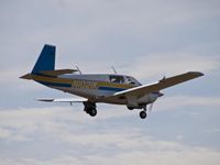 N1021K @ KBFI - Mooney M20J over Boeing Field - by Eric Olsen