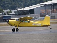 N64205 @ KBFI - Cessna 180K taking in after landing. - by Eric Olsen