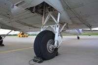 C-FTGX @ LOWG - Main landing gear of a 72 year old DC-3, making a night-stop at LOWG, Graz