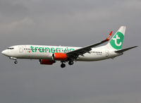 PH-GUA @ LEBL - Landing rwy 25R in Transavia c/s with additional GOL c/s on engines and winglets... - by Shunn311