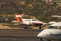 XB-DKH @ MMSD - Parked far north section of airport by highway. - by Remi Farvacque
