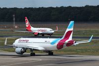 D-AEWD @ EDDT - Rivals in business waiting for departure.... - by Holger Zengler
