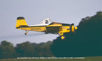 N5598X @ ESN - Spraying . - by J.G. Handelman