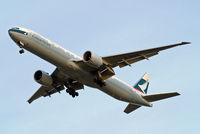 B-KQS @ EGLL - Boeing 777-367ER [42144] (Cathay Pacific Airways) Home~G 10/01/2015. On approach 27R.