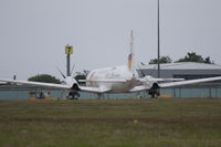 SE-MAM @ EGJB - On stand 7 at Guernsey (reg. on nosewheel door)