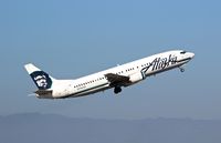 N793AS @ KSJC - Alaska Airlines departing in their 1998 Boeing 737-400 for an early morning departure at San Jose International Airport, CA. - by Chris Leipelt