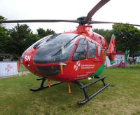 G-WASN - Off airport. Wales Air Ambulance helicopter on display at the Wales National Air Show held in Swansea, Wales, UK. - by Roger Winser