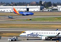 N171SY @ KSJC - Alaska with their new 2015 Embraer 170-200 at San Jose International Airport, CA. Pushing back on Z for departure. - by Chris Leipelt
