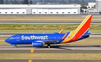 N920WN @ KSJC - Southwest taxing to the gate with their 2008 Boeing 737-400 at San Jose International Airport, CA. - by Chris Leipelt