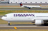 N580HA @ KSJC - Hawaiian Airlines taxing on Y for a departure to Hawaii at San Jose International Airport, CA. - by Chris Leipelt
