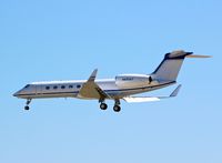 N885WT @ KSJC - Qualcomm Inc (San Diego, CA) Gulfstream G550 landing at San Jose International Airport, CA. - by Chris Leipelt