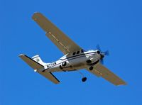 N214M @ KSJC - So-Cal based 1985 Cessna P210R landing at San Jose International Airport, CA. - by Chris Leipelt