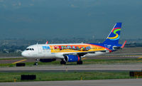 N618NK @ KDEN - Taxi Denver - by Ronald Barker