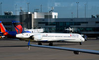 N907DA @ KDEN - Taxi Denver - by Ronald Barker