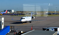 N975SW @ KDEN - Taxi Denver - by Ronald Barker