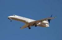 N24128 @ KDEN - EMB-145XR - by Mark Pasqualino