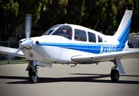 N33807 @ KRHV - Locally-based 1975 Piper PA-28R taxing in after landing at Reid Hillview Airport, San Jose, CA. Thanks for the wave! - by Chris Leipelt