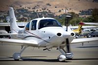 N163RW @ KRHV - Tactical Air Support Inc (Reno, NV) 2012 Cirrus SR20 taxing out for departure after getting some fuel at Reid Hillview Airport, San Jose, CA. - by Chris Leipelt