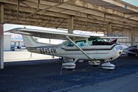 N8454M @ KRHV - Locally-based 1976 Cessna 182P parked at its tie down under the shelters at Reid Hillview Airport, San Jose, CA. - by Chris Leipelt