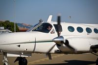 N421KK @ KRHV - Locally-based Cessna 421C taxing in at Reid Hillview Airport, San Jose, CA. Thanks for the wave! - by Chris Leipelt