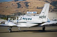 N421KK @ KRHV - Locally-based Cessna 421C taxing to the Lafferty ramp at Reid Hillview Airport, San Jose, CA. - by Chris Leipelt