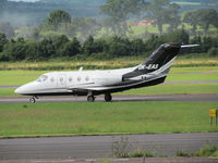 OK-EAS @ EGTE - about to leave - from across apron - by magnaman