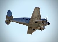 N118SA @ E16 - Locally-based 1954 Beech E18S doing low pass over South County Airport, San Martin, CA. - by Chris Leipelt