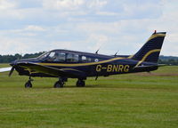 G-BNRG @ EGLM - Piper Cherokee Warrior II at White Waltham. Ex N83810 - by moxy