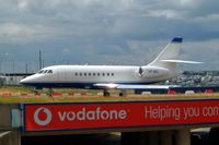 VP-BDL @ EGGW - Dassault Falcon 2000 [111] Luton~G 25/06/2004 - by Ray Barber