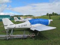 G-CFMP @ EGHP - out back at popham - by magnaman