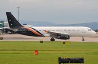 G-POWK @ EGCC - Titan A320 taxiing of another flight from MAN. - by FerryPNL