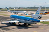 PH-KCC @ EHAM - McDonnell Douglas MD-11 [48557] (KLM Royal Dutch Airlines) Amsterdam-Schiphol~PH 13/09/2003 - by Ray Barber