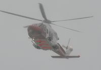 G-SARE @ EGHH - Just visible during a low pass in very low cloud - by John Coates