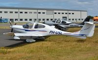 PH-USL @ EGHH - Wings over Holland logos - by John Coates