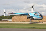 G-BSGF @ EGBR - Robinson R.22 Beta at The Real Aeroplane Company's Helicopter Fly-In, Breighton Airfield, September 2011. - by Malcolm Clarke