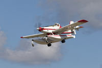 C-FDHK @ CYXX - Landing - by Guy Pambrun