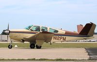 N12PM @ KOSH - Beech S35 - by Mark Pasqualino